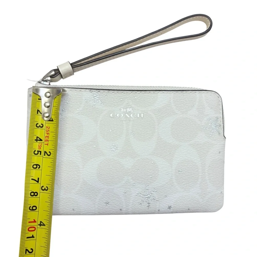 Coach white snowflake signature Wristlet bag